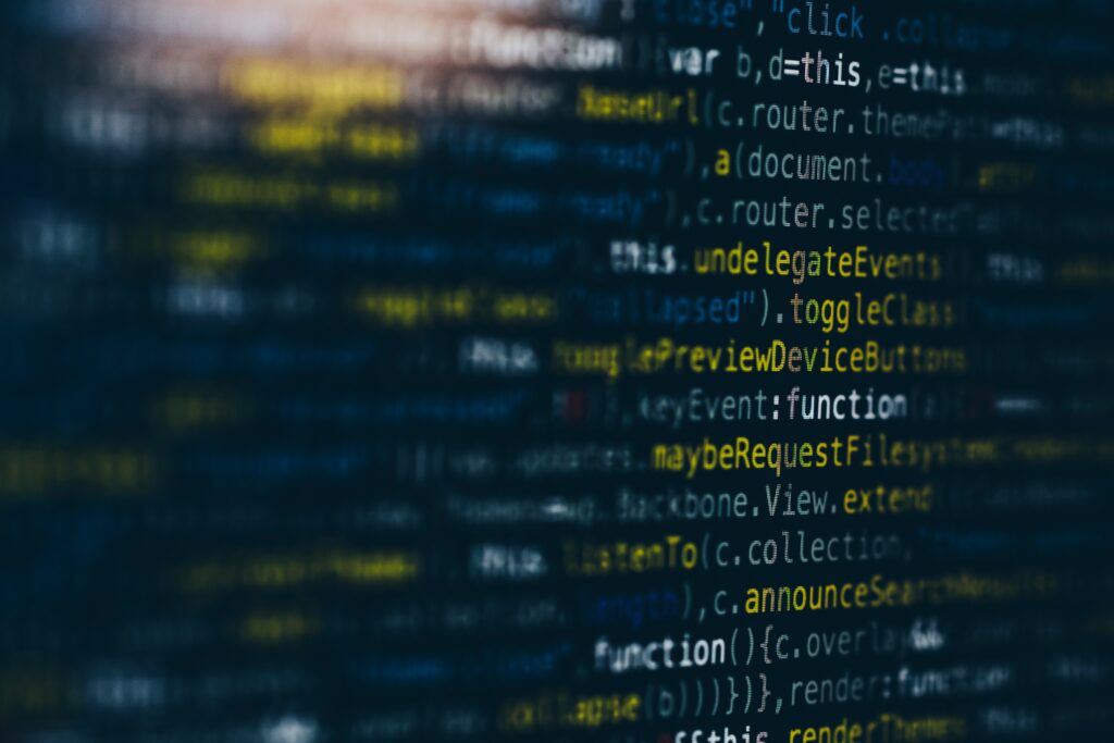 Screen with code in yellow and blue colors.